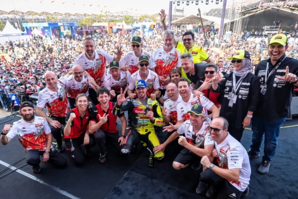 Di Giannantonio Sprint podium celebration with VR46 team members and fans at Mandalika